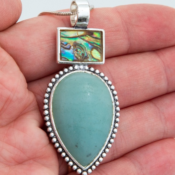 Southwestern pendant turquoise look pear stone, silver look accents Roman stamp - Picture 8 of 11